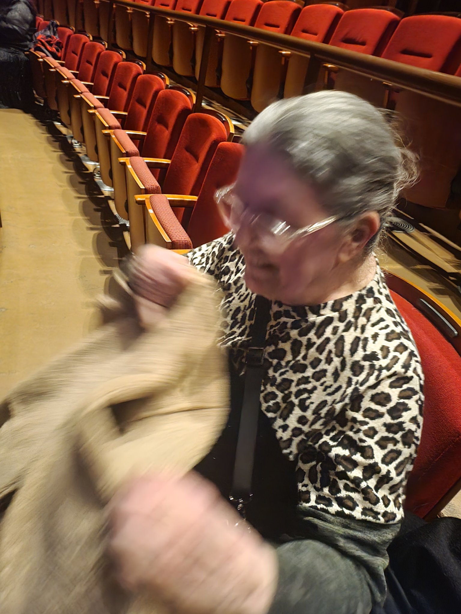 La Bohème — Mom laughing, caught candid with her coat, Sat · Jan 20, 2024