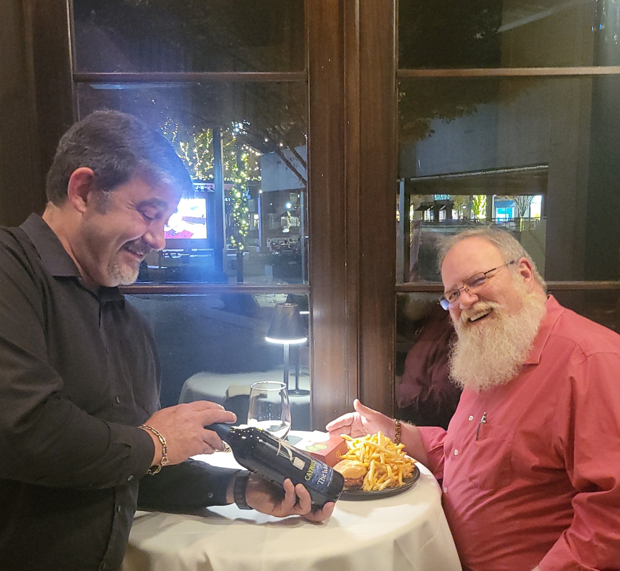 McRib is back! — at Stage — wine being poured at the table, Jeffry laughing, Wed · Nov 27, 2024