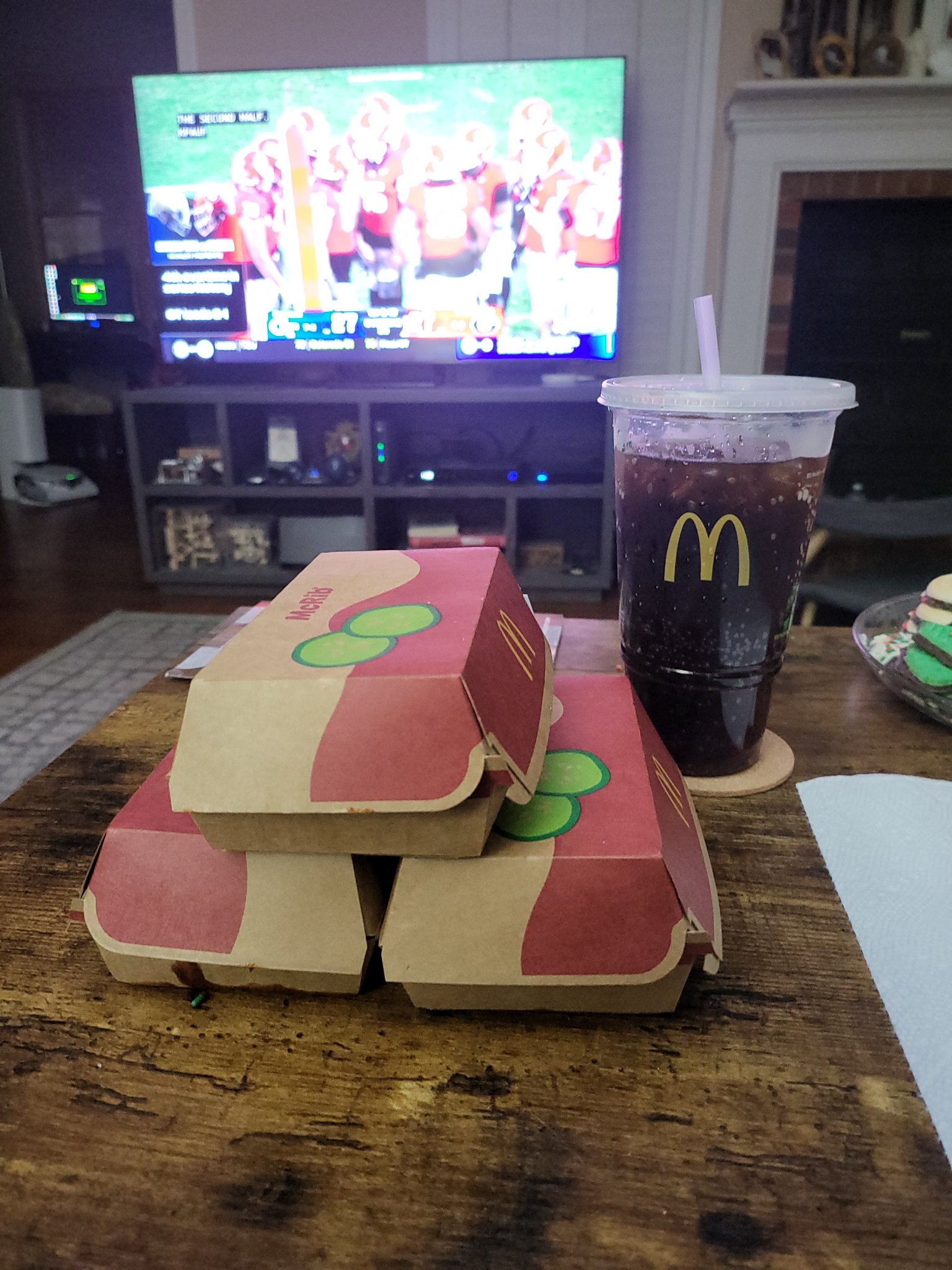 McRib is back! — two days later at home — McRib boxes on the table, football on TV, Fri · Nov 29, 2024