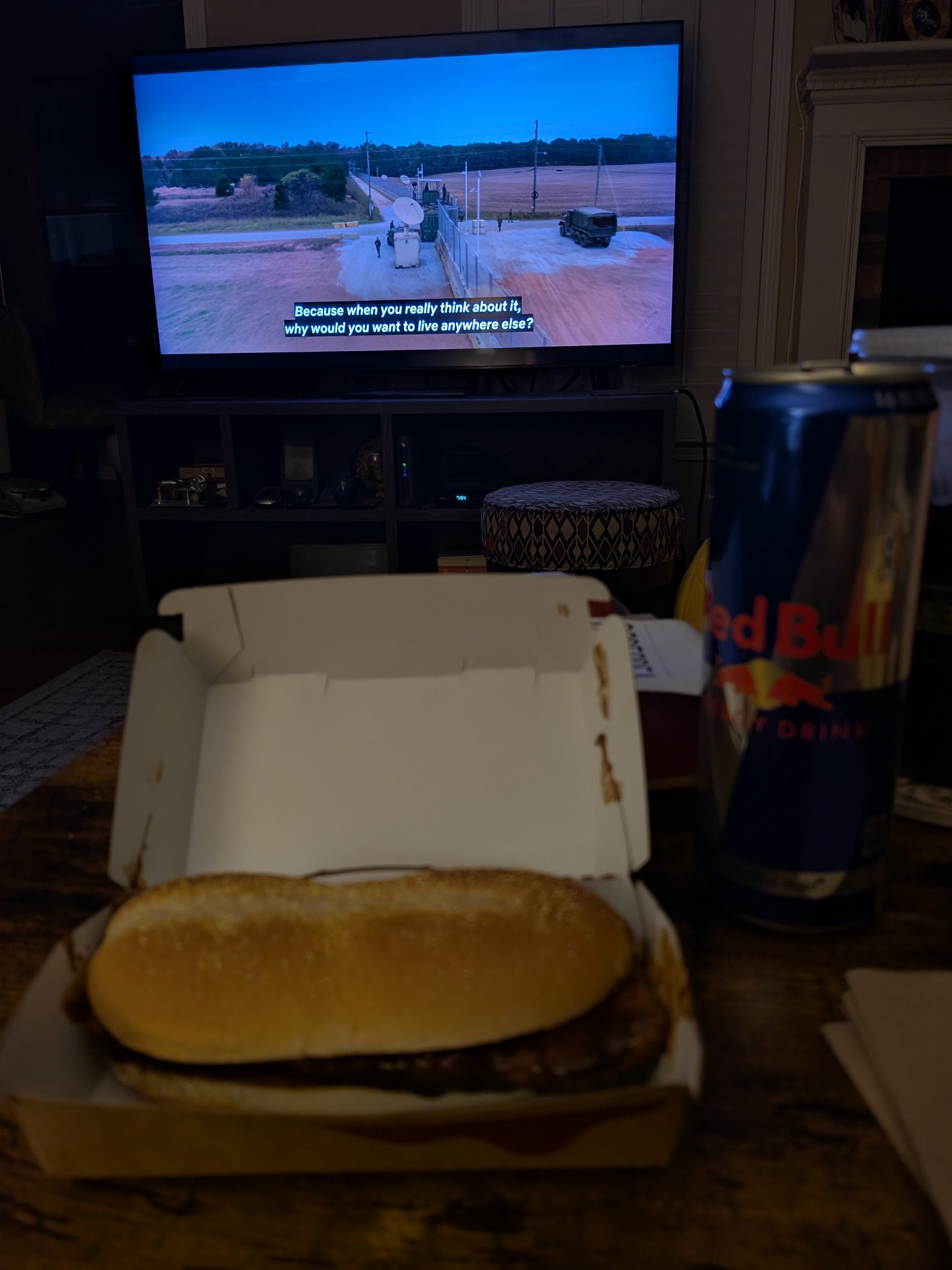 McRib is back! — the McRib in its box at home, the TV on behind, Mon · Dec 1, 2025